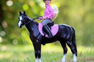 Breyer model #1630 and features a pretty black Saddlebred with English tack and rider
